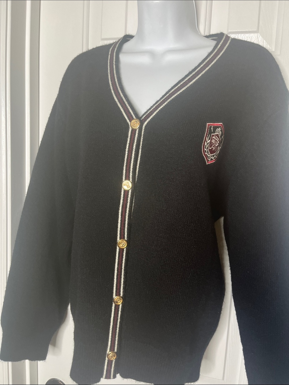 Black Varsity Cardigan with Crest V-Neck and Gold Tone Buttons